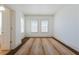 Empty bedroom with neutral walls, carpet, and bright windows at 2500 Peachtree Nw Rd # 605S, Atlanta, GA 30305