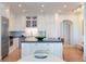 Bright kitchen with stainless steel appliances and a large central island at 2500 Peachtree Nw Rd # 605S, Atlanta, GA 30305