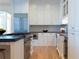 Bright kitchen with stainless steel appliances and white custom cabinetry at 2500 Peachtree Nw Rd # 605S, Atlanta, GA 30305