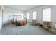 Serene bedroom with ample natural light, brass bed frame, and seating area at 2500 Peachtree Nw Rd # 605S, Atlanta, GA 30305