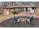 Backyard featuring fire pit and chairs at 2722 Oswood Dr, Tucker, GA 30084