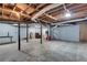 Spacious unfinished basement with exposed ductwork and concrete floors at 2722 Oswood Dr, Tucker, GA 30084