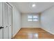 Cozy bedroom featuring hardwood floors and ample natural light at 2722 Oswood Dr, Tucker, GA 30084