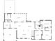 Floor plan layout of the house with living room, kitchen, dining area, sunroom, laundry, garage, bedrooms, and baths at 2722 Oswood Dr, Tucker, GA 30084