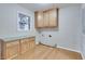 Laundry room with cabinets and a window for natural light at 2722 Oswood Dr, Tucker, GA 30084