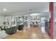 Bright living area featuring hardwood floors, stylish furniture, and an open layout to the kitchen at 2722 Oswood Dr, Tucker, GA 30084