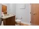 Bathroom features granite counters and a toilet at 1253 Caroline Ne St, Atlanta, GA 30307
