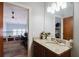 Granite countertop bathroom leading into another room with an open concept design at 1253 Caroline Ne St, Atlanta, GA 30307