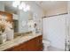 Bathroom features granite counters, a shower, and a toilet at 1253 Caroline Ne St, Atlanta, GA 30307