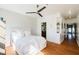 Bedroom boasts a modern ceiling fan, hardwood flooring, and serene decor elements at 1253 Caroline Ne St, Atlanta, GA 30307