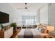 Bright bedroom features wood floors, a ceiling fan, and lofted second-floor views at 1253 Caroline Ne St, Atlanta, GA 30307
