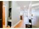 Hallway features hardwood floors leading into a home with modern fixtures at 1253 Caroline Ne St, Atlanta, GA 30307