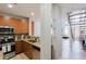 Modern kitchen with stainless steel appliances, granite counters, and a breakfast bar at 1253 Caroline Ne St, Atlanta, GA 30307