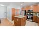 Kitchen with stainless steel appliances, granite counters, and a center island at 1253 Caroline Ne St, Atlanta, GA 30307