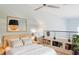 Main bedroom with a decorative shelving, ceiling fan, and a neutral color palette at 1253 Caroline Ne St, Atlanta, GA 30307
