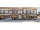 Daytime street view of commercial buildings, storefronts, and parked cars at 1253 Caroline Ne St, Atlanta, GA 30307