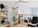 Bright, open-concept upper level with shelves, a desk, and view of the downstairs living space at 1253 Caroline Ne St, Atlanta, GA 30307