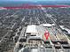 Aerial view of a property near I-20, with a large parking area, commercial buildings, and residential surroundings at 1253 Caroline Street Northeast, Atlanta, GA 30307