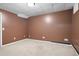 Bedroom featuring carpet flooring, neutral walls, and ample closet space at 514 Lovinggood Ct, Woodstock, GA 30189