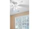 Close up of bedroom window and ceiling fan at 514 Lovinggood Ct, Woodstock, GA 30189