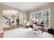 Entryway featuring an open floor plan, staircase, and an office with a large window at 514 Lovinggood Ct, Woodstock, GA 30189