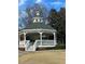 Classic white gazebo set in a manicured lawn, ideal for community events and gatherings at 514 Lovinggood Ct, Woodstock, GA 30189