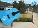 A large blue guitar sign for the Woodstock 2024 Summer Concert Series is outside near some bushes at 514 Lovinggood Ct, Woodstock, GA 30189