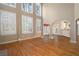 Spacious living room featuring tall windows and hardwood floors at 514 Lovinggood Ct, Woodstock, GA 30189