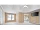 Large main bedroom boasts a tray ceiling, ample windows, and an en suite bathroom at 514 Lovinggood Ct, Woodstock, GA 30189