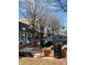 Charming street view featuring shops, restaurants and a sidewalk. Tree lined street with parking at 514 Lovinggood Ct, Woodstock, GA 30189