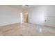 Spacious bedroom with tiled floors, neutral color palette and multiple doorways at 2629 Apple Valley Ne Rd, Brookhaven, GA 30319