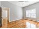 Bedroom with hardwood floors, open door and window, allowing for lots of light at 2629 Apple Valley Ne Rd, Brookhaven, GA 30319