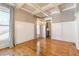 Dining room with hardwood flooring, coffered ceilings, and bright natural light at 2629 Apple Valley Ne Rd, Brookhaven, GA 30319