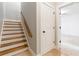 Hallway featuring stairs, tiled floor, with access to additional rooms at 2629 Apple Valley Ne Rd, Brookhaven, GA 30319