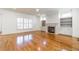 Bright living room featuring fireplace, built-in shelves, and large windows at 2629 Apple Valley Ne Rd, Brookhaven, GA 30319