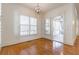 Sunlit dining area with shuttered windows and access to a screened porch at 2629 Apple Valley Ne Rd, Brookhaven, GA 30319