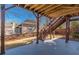 Covered patio beneath a large, multi-story deck at 2629 Apple Valley Ne Rd, Brookhaven, GA 30319