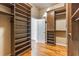 Custom walk-in closet with built-in shelving and drawers providing plenty of storage options at 2629 Apple Valley Ne Rd, Brookhaven, GA 30319