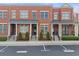 Charming brick townhome with well-manicured landscaping and reserved parking at 4740 Cypress Commons, Atlanta, GA 30338