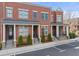 Attractive brick townhome with manicured landscaping and reserved parking at 4740 Cypress Commons, Atlanta, GA 30338