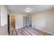 Bedroom with hardwood floor, and doorway to the bathroom at 961 Kingston Nw Rd, Conyers, GA 30012