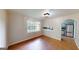 Bright dining room with tile floor, view to kitchen, and large window at 961 Kingston Nw Rd, Conyers, GA 30012