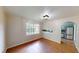 Open dining room with large window and doorway to the kitchen at 961 Kingston Nw Rd, Conyers, GA 30012