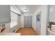 Cozy kitchen nook featuring tiled floor, a window, and access to a pantry at 961 Kingston Nw Rd, Conyers, GA 30012