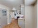 Traditional kitchen with brown tile floor, light gray cabinets, and stainless steel appliances at 961 Kingston Nw Rd, Conyers, GA 30012