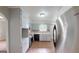 Functional kitchen featuring neutral countertops and stainless steel appliances at 961 Kingston Nw Rd, Conyers, GA 30012