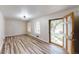 Inviting living area with wood flooring and an open doorway view at 961 Kingston Nw Rd, Conyers, GA 30012