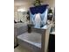 Bathroom features soaking tub, designer tiling, and decoratively framed window at 2761 Trebek Ct, Mcdonough, GA 30253