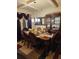 Elegant dining room featuring decorative accents, and stylish wood dining table at 2761 Trebek Ct, Mcdonough, GA 30253
