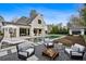 Backyard featuring a pool, outdoor seating area, and well-manicured landscaping at 100 Tuxedo Nw Ter, Atlanta, GA 30342